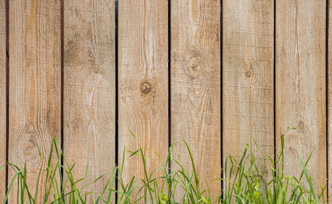 McNairy County fence repair: replacing leaning posts and sagging panels on an existing wood privacy fence